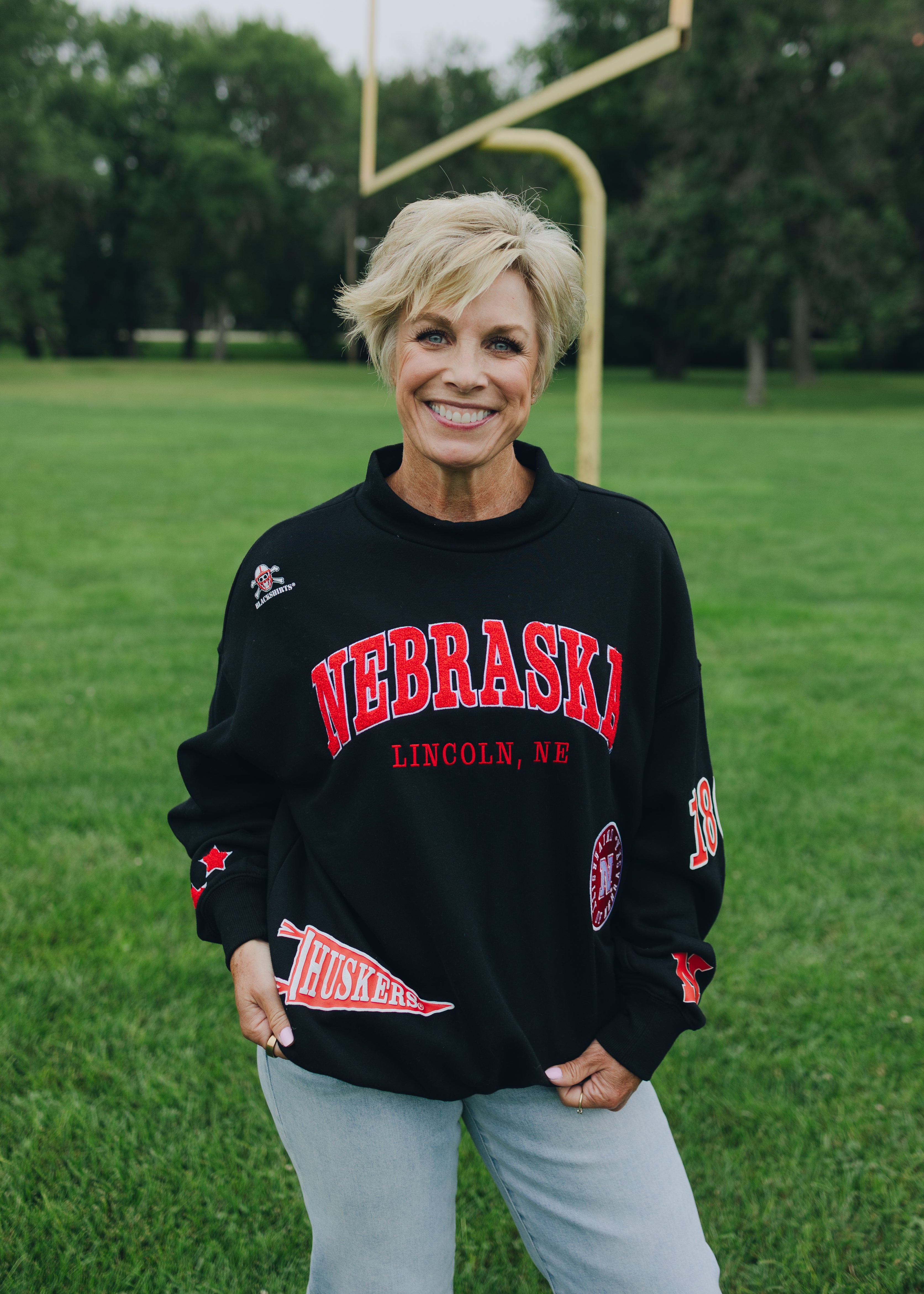 Nebraska All Over Scatter Oversized Funnel Neck