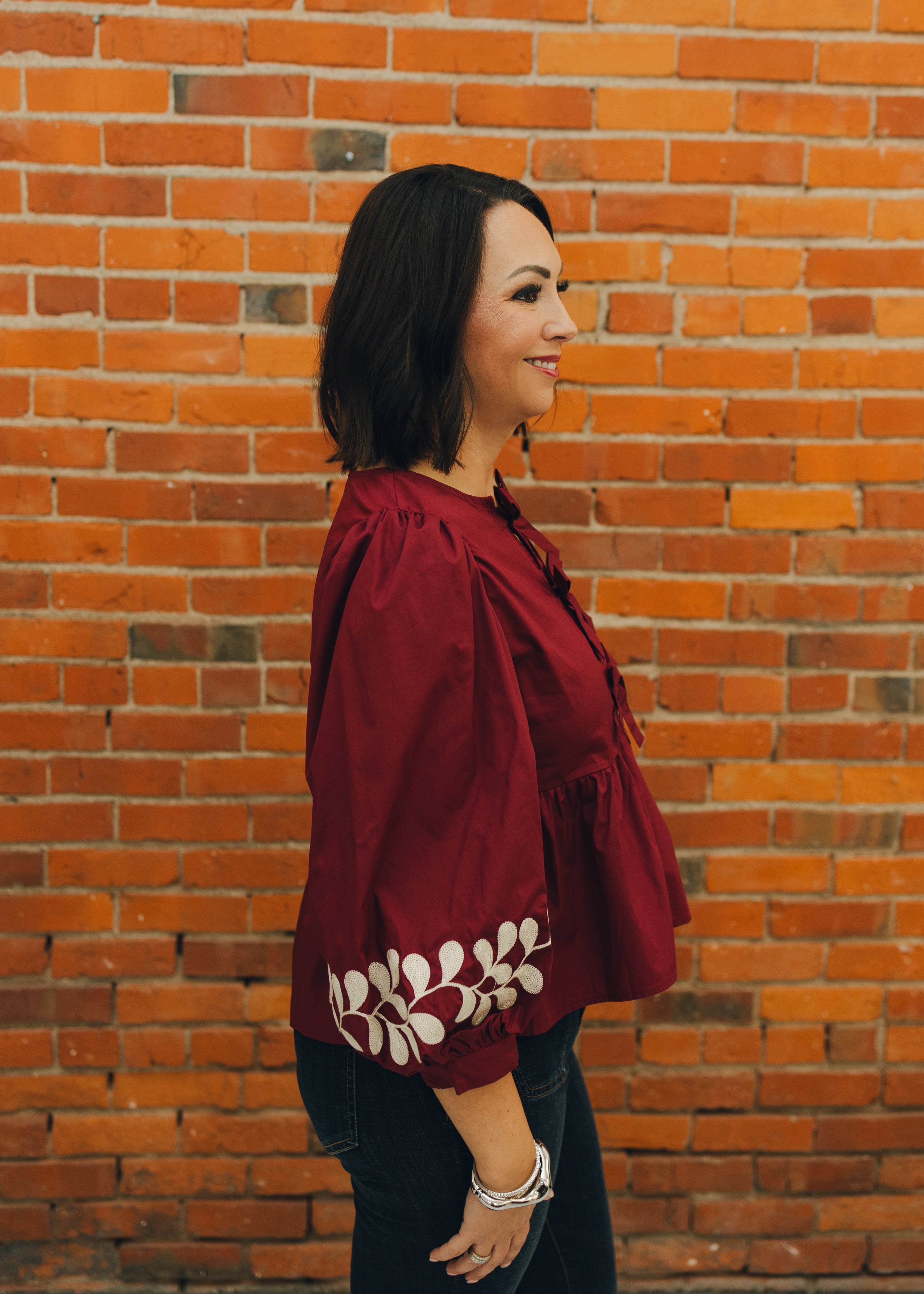 Front Bow Tie Embroidered Peplum Top