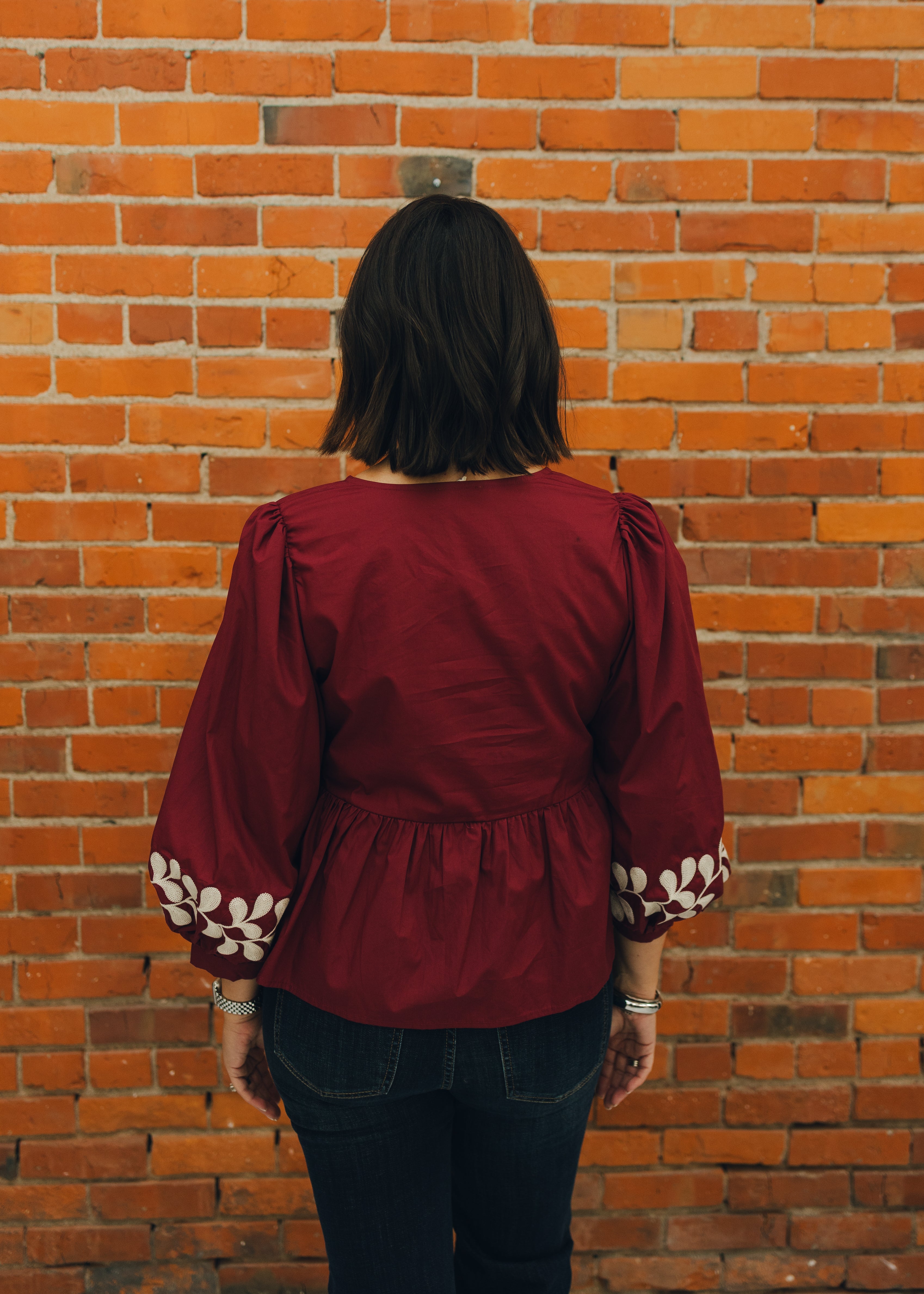 Front Bow Tie Embroidered Peplum Top