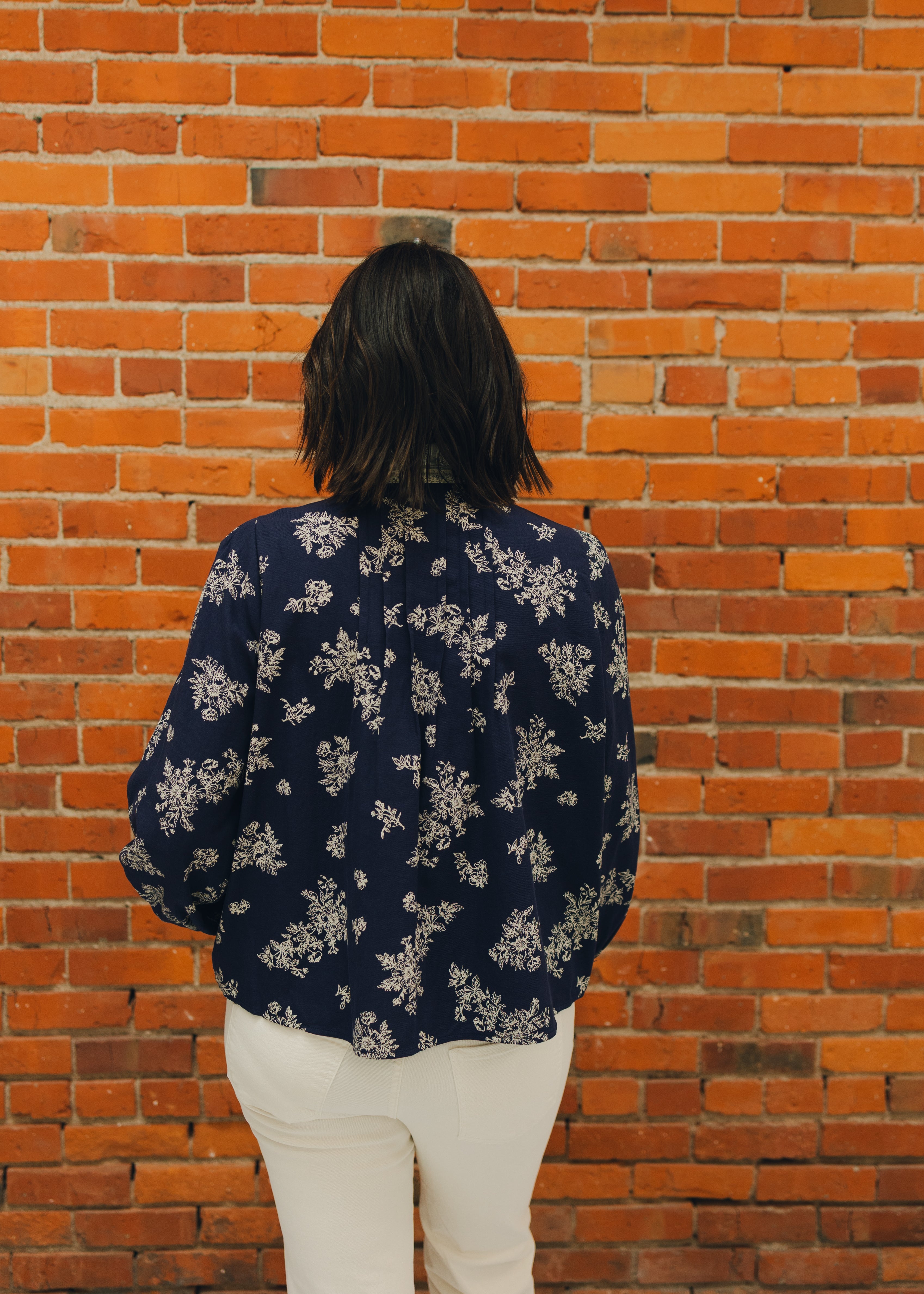 Pintuck Detail Ruffled Neck Floral Top