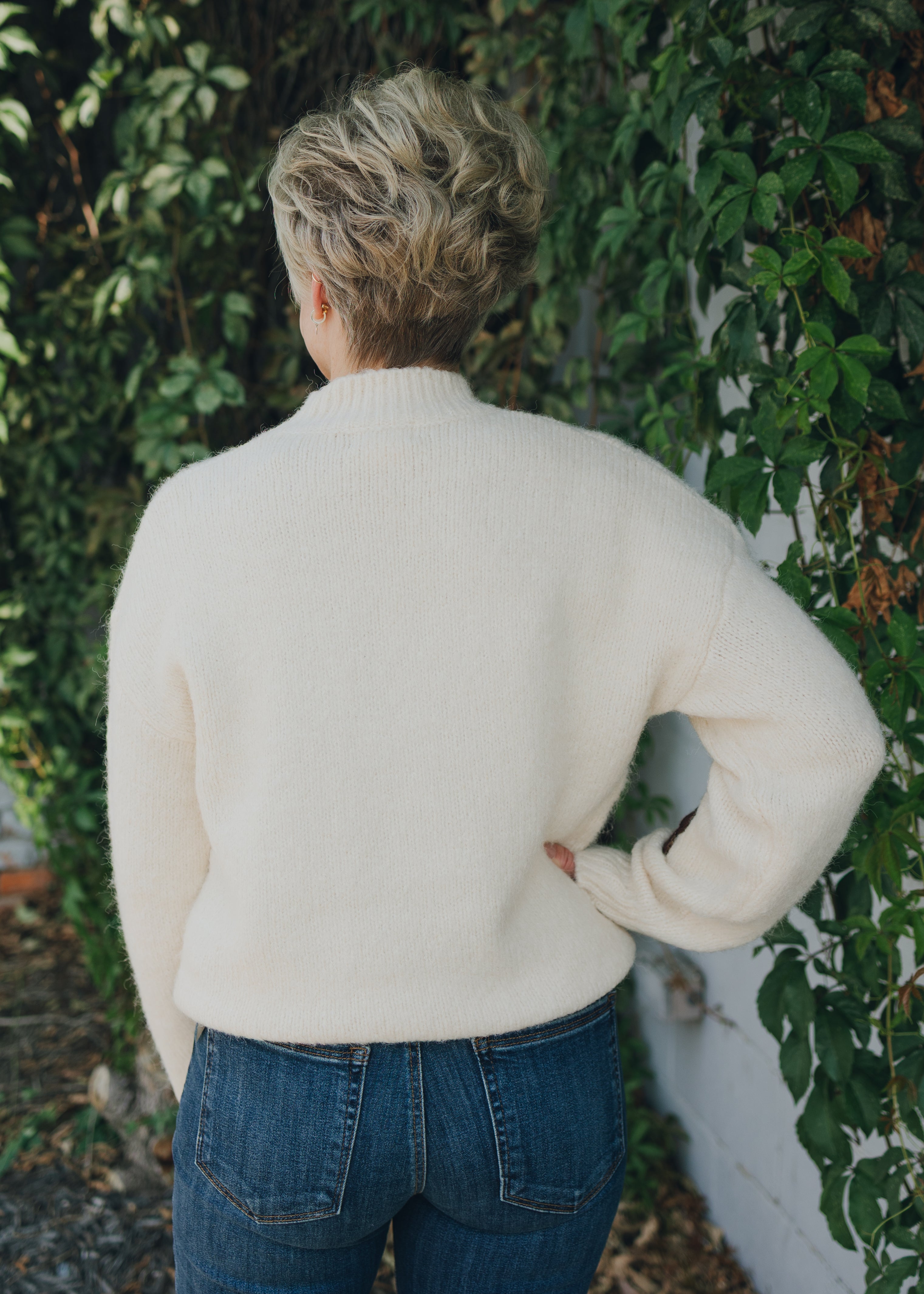 Apricot Embroidered Flower Mock Neck Sweater