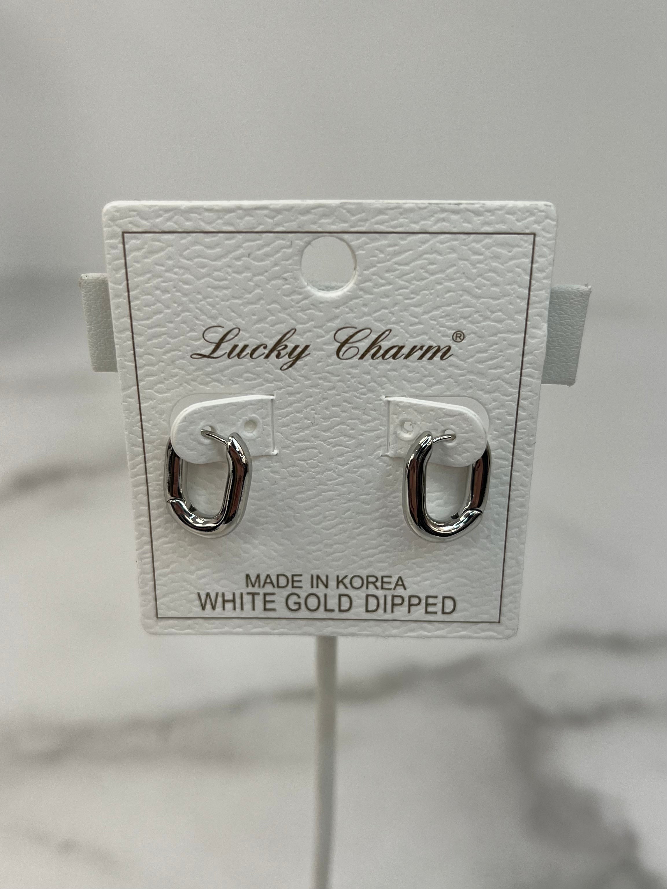 Gold-Dipped Oval Huggie Earrings